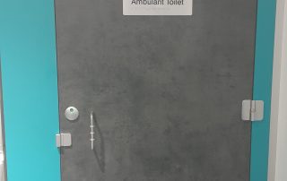 Ambulent Toilets + Brail Signs